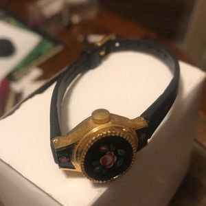 Black banded watch with roses